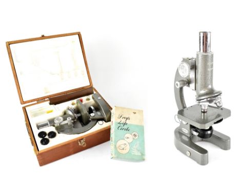 A children's illuminated microscope with three lenses, glass slides and dissecting tools in wooden carry case, also a Japanes