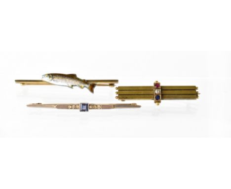 A 15ct yellow and white gold Art Deco bar brooch set with sapphires and small diamond, approx 2.7g, a 15ct yellow gold Art De