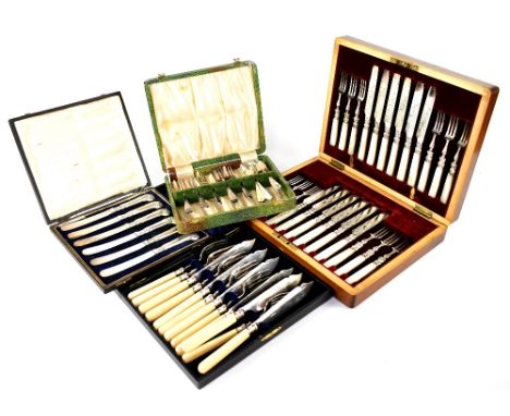 A George V hallmarked silver cased set of pistol-handled fruit knives, Sheffield 1911, three cased sets of flatware to includ