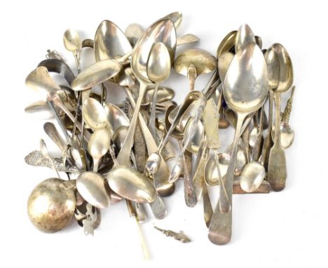 A quantity of hallmarked silver and white metal flatware to include dessert spoons, teaspoons, sugar tongs, mustard spoons, s