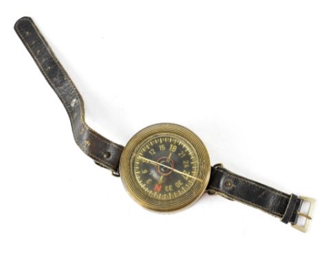 A WWII German Luftwaffe airman/aircrew's wrist compass, marked AK39, 134781, FI 23235, numbered 134781, water filled, black d