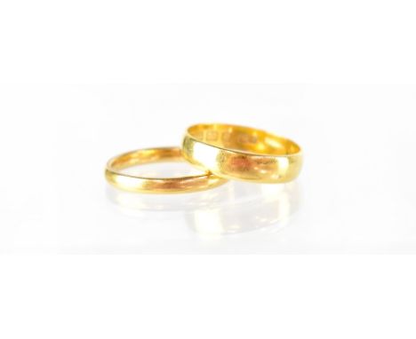 Two 22ct gold band rings (thin and wide), both size U/R, combined approx 7.5g (2). CONDITION REPORT There are no obvious sign