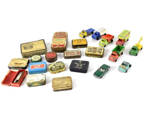 A collection of vintage tins, a small collection of vintage diecast cars, a miniature harmonica and miniature shaving kit.