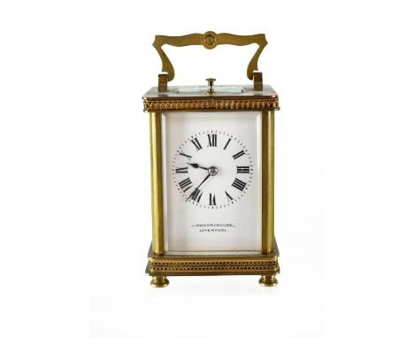 J Dwerryhouse, Liverpool; a brass-cased carriage clock, the dial set with Roman numerals and maker's name, height 12cm. CONDI