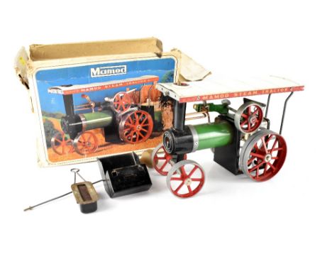 A Mamod steam tractor, with burner tray, steering rod and defective box.