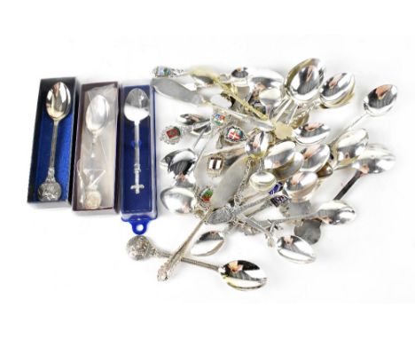 A quantity of various tourist enamel top collectors' spoons including ten silver hallmarked examples and nine bearing Contine