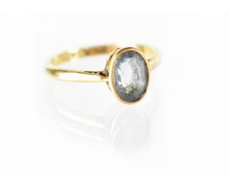 An aquamarine and 18ct gold dress ring, size K, approx 2.2g.