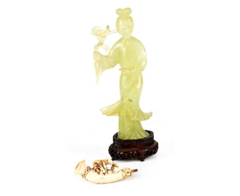 A modern green jade figure of a geisha on pierced wood stand, height with stand 24cm and a Meerschaum pipe with horse and fal