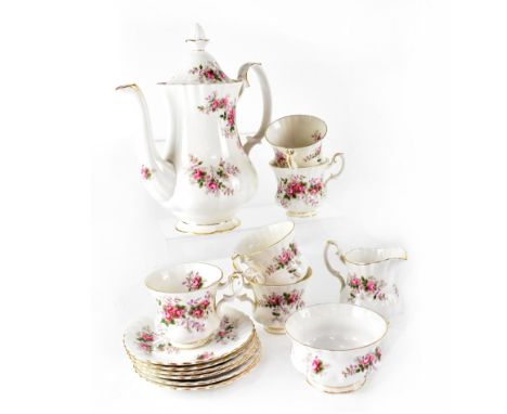 A part Royal Albert 'Lavender Rose' tea service comprising teapot, five cups, six saucers, sugar bowl and milk jug.