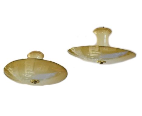 A retro glass two-part lamp shade comprising smaller bell-shaped section attaching to a large shallow dish with yellow metal 