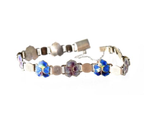 A hallmarked silver and enamelled link bracelet with enamelled pansies. CONDITION REPORT Maker J F, lion passant. Small areas