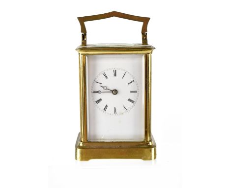 An early 20th century brass-cased carriage clock, the dial set with Roman numerals, height 12cm. CONDITION REPORT Please note