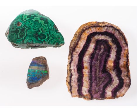 A mixed collection of stones, including a large piece of malachite, measuring approx. 11.0cm x 9.0cm; a piece of boulder opal