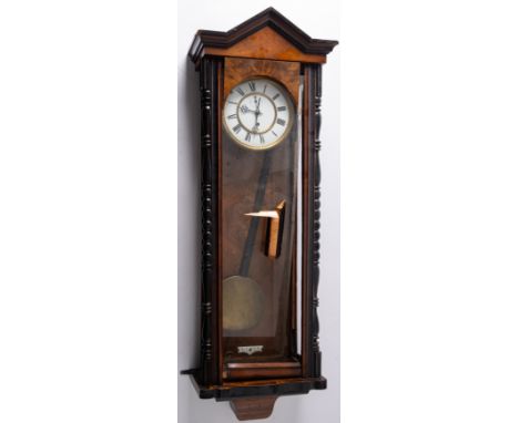 A German Vienna-style regulator timepiece having an eight-day duration, weight-driven timepiece movement with a dead-beat esc