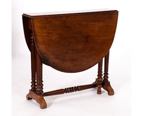 A Victorian mahogany oval Sutherland table, late 19th century; with fluted legs to sled bases with a conforming stretcher; 72