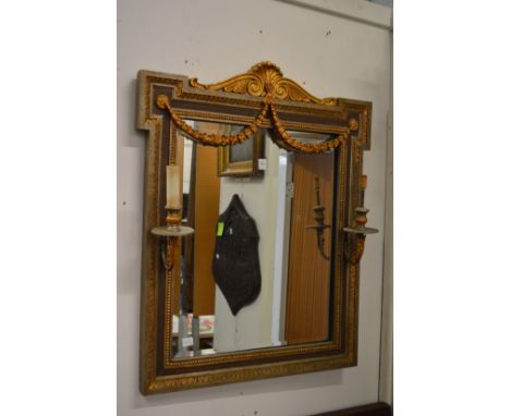 Decorative over mantel mirror with pair of light fittings.
