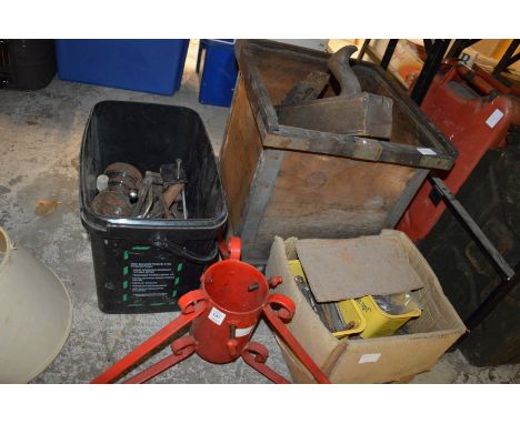 Christmas tree holder and various tools.