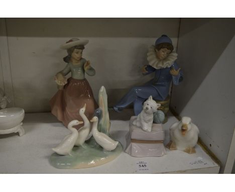 Five Lladro and Nao figures.