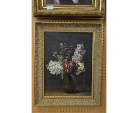 Still life of flowers in a vase, oil on canvas in a decorative gilt frame.