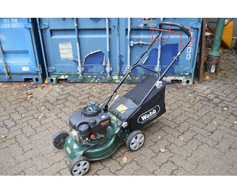 A Webb petrol rotary lawn mower.