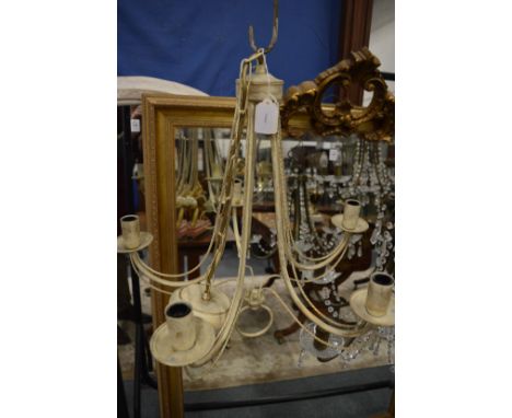 A painted five branch chandelier.