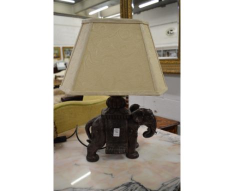 A bronze resin table lamp modelled as an elephant.