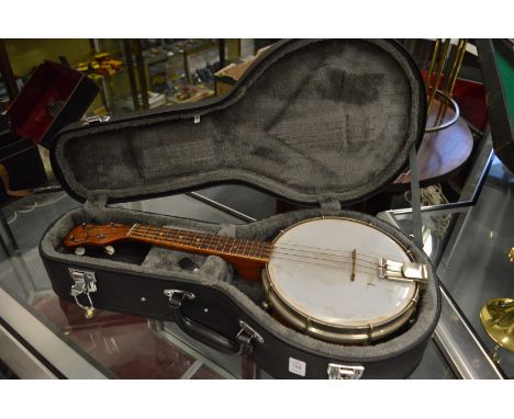 A George Formby banjolele, with case.