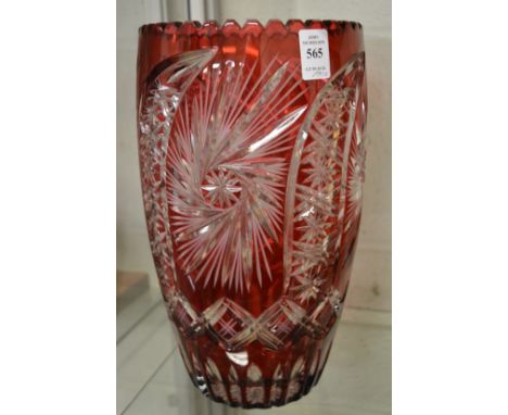 A large pair of Bohemian ruby tinted cut glass vases.