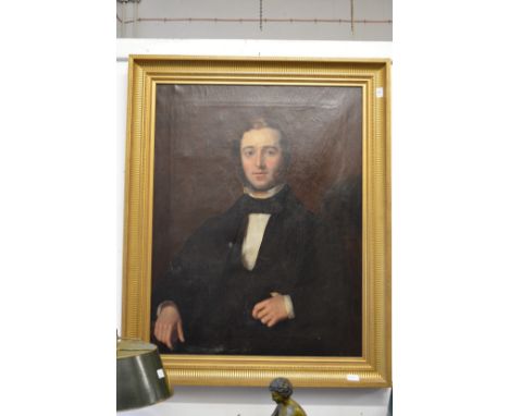 19th century English school, half length portrait of a seated gentleman wearing a black jacket, oil on canvas in a gilt frame