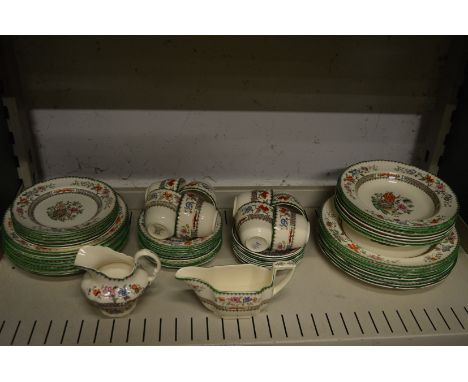 A quantity of Copeland Spode Chinese Rose dinnerware and eight cups and saucers, side plates etc.