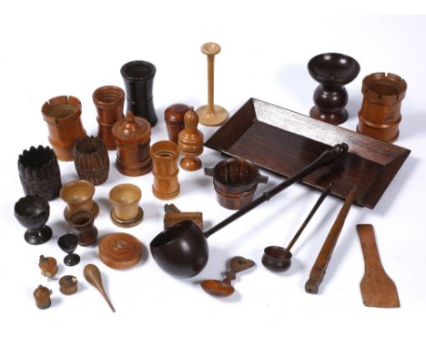 A collection of treen to include a ladle, various cylindrical containers, a miniature bucket and other items