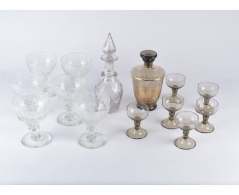 A set of six etched glass rummers an Art Deco decanter and six smoky glasses and a decanter