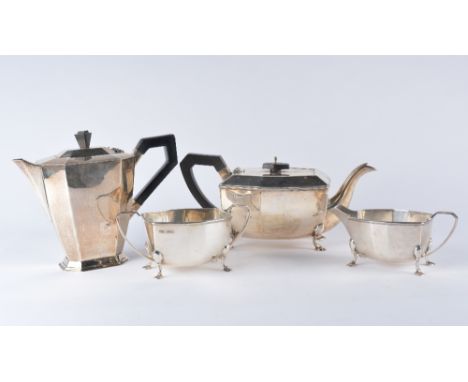 A silver four piece tea and coffee service of tapering canted form comprising a teapot, a coffee pot, a milk jug and sugar ba