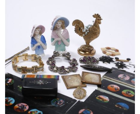 A box of miscellaneous containing two ceramic pin-cushion ladies, a pin-cushion in the form of a cockerel, a papier mache snu