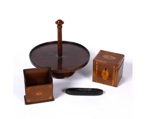 A George III inlaid square tea caddy, a lazy Susan, a letter rack and a lacquer spectacle case 94)