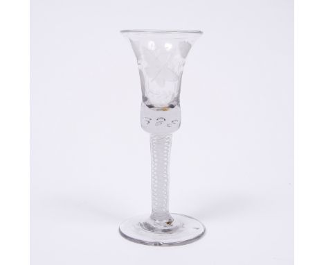 A Dutch wine glass with double twist stem and engraved with a butterfly and flowerhead
