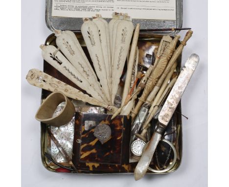 A group of miscellaneous pieces to include tortoise-shell and mother of pearl carved card cases