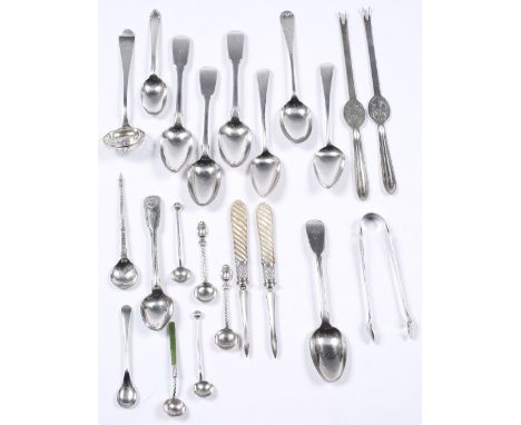 A small collection of miscellaneous silver wares including teaspoons, silver plated crab picks, plated tongs, mother of pearl