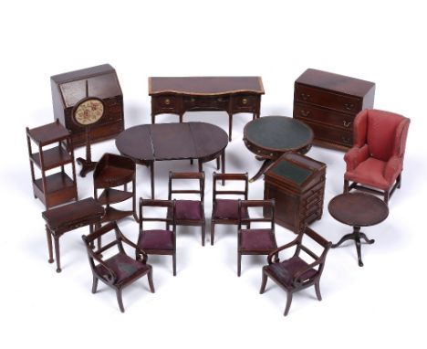 A collection of miniature craftsman made dolls house furniture  to include a dining table and chairs, a davenport, a drum tab