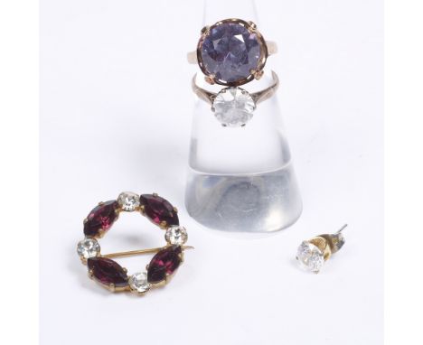 A 9ct gold ring with single stone setting, an amethyst and white stone brooch, a further ring and single earring