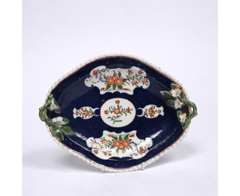 A Dr Wall Worcester oval platter of blue scale ground reserving Oriental flowering trees, flower and twig handles, rare Red L