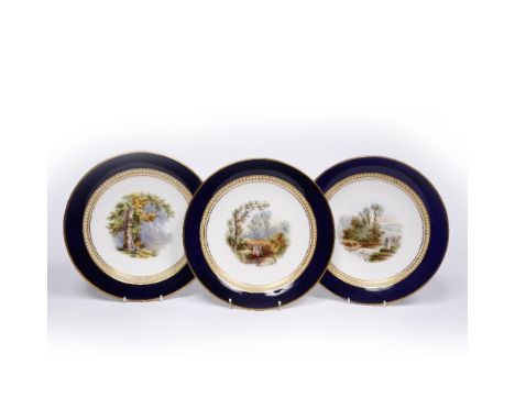 Three Grainger Worcester plates painted landscapes by John Stinton senior surrounded by pearls of fine gilding, circa 1875 pa