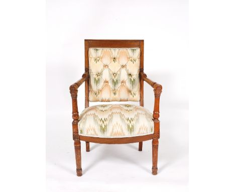 A 19th Century French carved mahogany armchair with upholstered button back, 90cm high, 58cm across