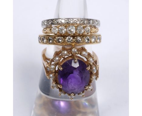 A collection of four various rings including two eternity rings, an 18ct gold ring with five stone diamond setting, an amethy