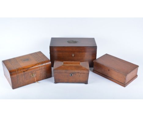 A Victorian mahogany tea caddy and three other boxes