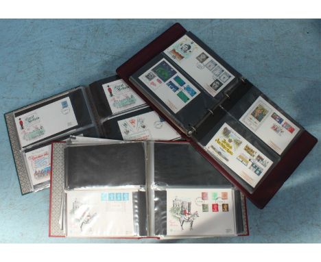 Approximately 217 Royal Mail First day Covers in three albums