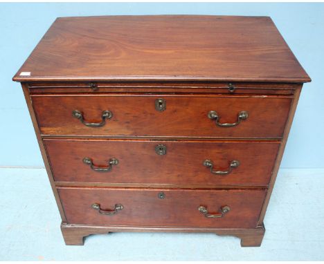 A 19th century mahogany Bachelor's chest, with brushing slide, above three long, graduated drawers and raised on shaped brack