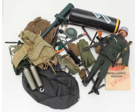 A Palitoy Action Man figure with various accessories including Special Mission Pod and assorted clothing and weapons etc.