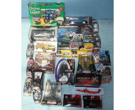 A varied collection of assorted boxed models and toys, including a selection of Titanium series Die-cast Star Wars figures, S