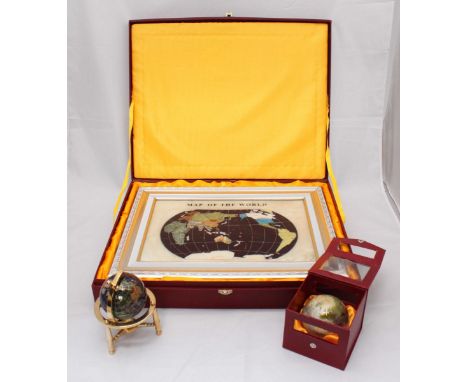 A hard gemstone-set 'map of the world tray', together with a small gemstone globe on stand and a gemstone-set globe paperweig